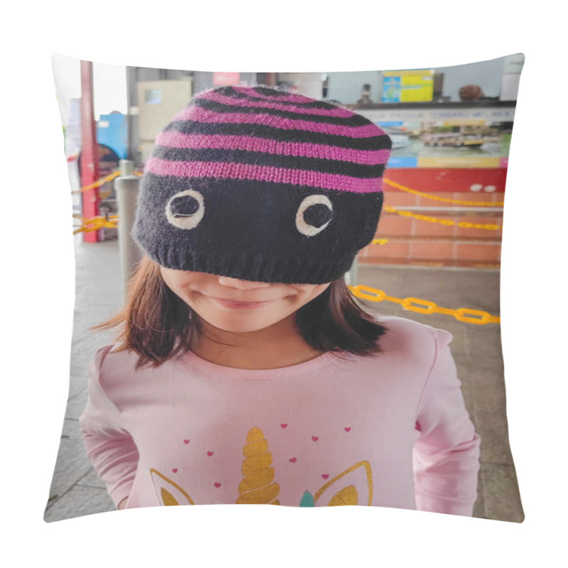 Personality  Little Girl Wearing Knitted Hat Covering Her Eyes And Showing A Fake Eyes. Happy Child. Pillow Covers