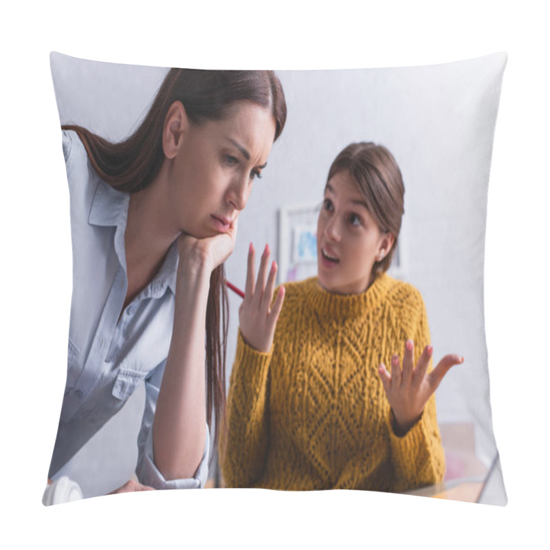 Personality  Worried Mother Near Displeased Teenage Daughter Gesturing On Blurred Background Pillow Covers