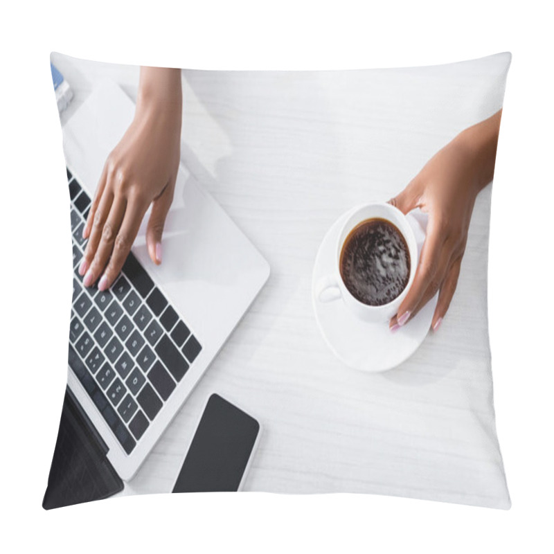 Personality  Cropped View Of African American Woman Using Laptop Near Smartphone With Blank Screen And Holding Cup Of Coffee  Pillow Covers