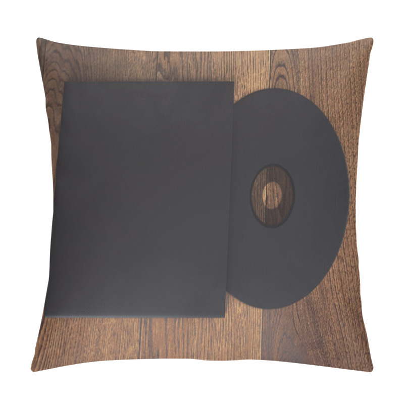 Personality  Topview Of Blank Black Compact Disk With Cover On Wooden Table. Mock Up, 3D Rendering Pillow Covers