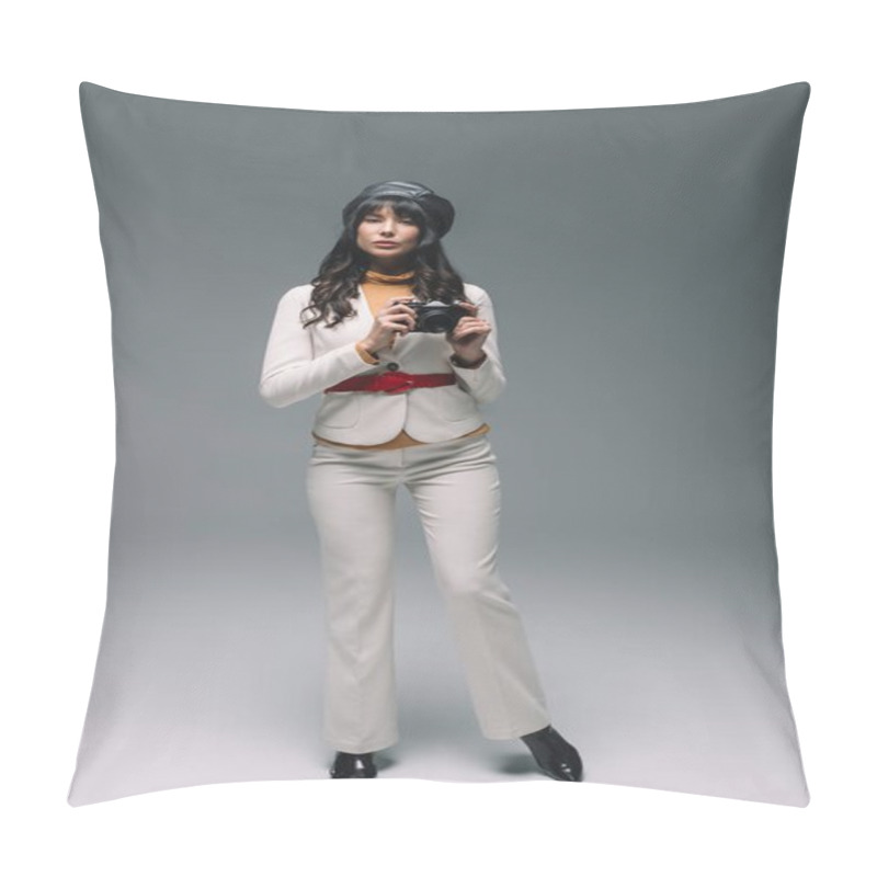 Personality  Attractive Brunette Woman In White Suit Standing With Film Camera On Gray Pillow Covers