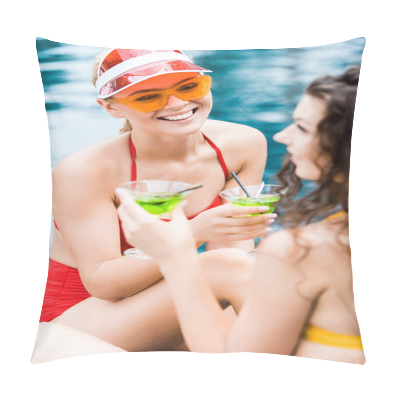 Personality  Happy Young Woman In Sunglasses And Cap-visor Sitting With Cocktail While Talking To Female Friend On Poolside Pillow Covers