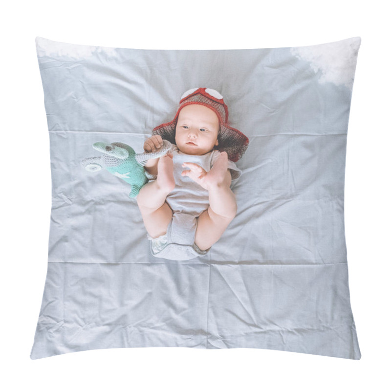 Personality  Top View Of Infant Child In Knitted Pilot Hat Playing With Toy Plane In Bed Pillow Covers