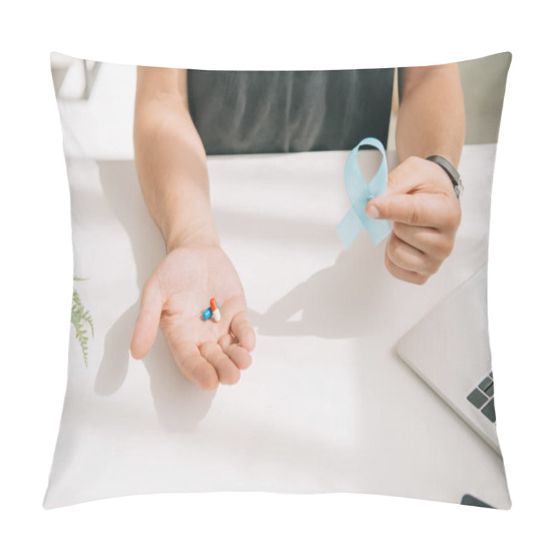 Personality  Cropped View Of Man In Black T-shirt Holding Blue Awareness Ribbon And Pills Pillow Covers