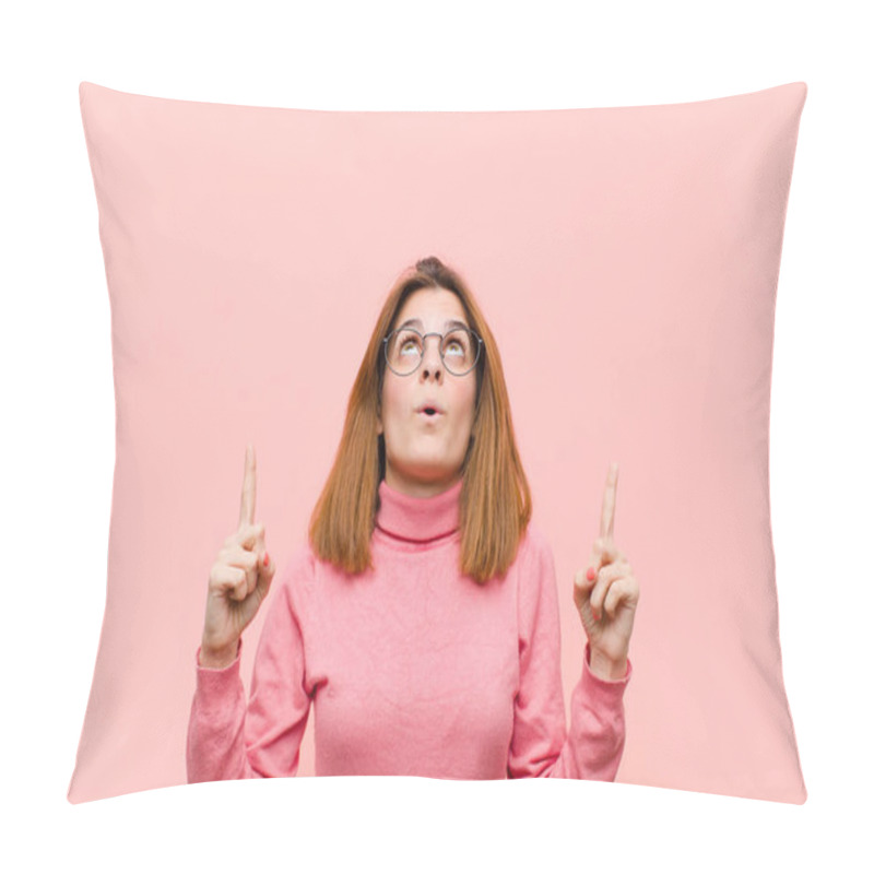 Personality  Young Pretty Woman Feeling Awed And Open Mouthed Pointing Upwards With A Shocked And Surprised Look Against Pink Background Pillow Covers