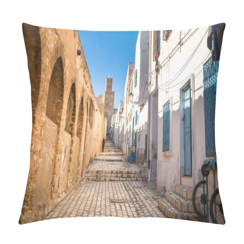 Personality  A Cobbled Aley Lined With White And Blue Houses Leading Up To The Kasbah And Its Lighthouse In The Medina Of Sousse. The Medina Is A UNESCO World Heritage Site. Pillow Covers