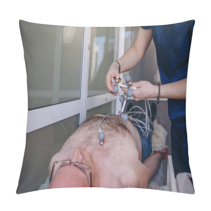 Personality  Cardiologist Examining Senior Patient With Holter Device In The Department Of Cardiology In The Hospital. Woman Doctor Attaches Sensors To Measure ECG And Blood Pressure. Matury Man On Clinic Couch Pillow Covers