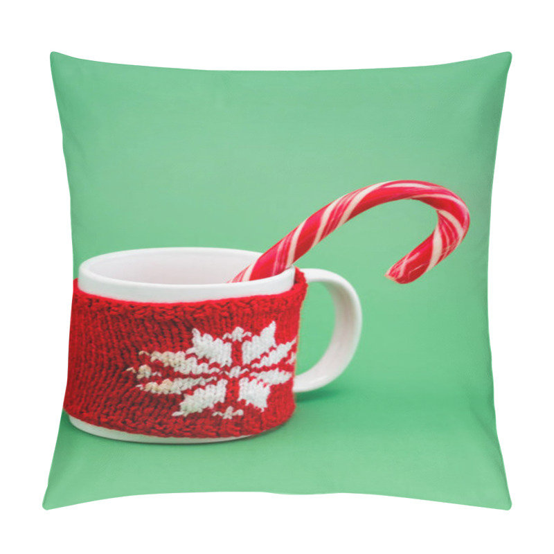 Personality  Candy Cane In Cup With Knitted Cup Holder With Snowflake On Green Background Pillow Covers