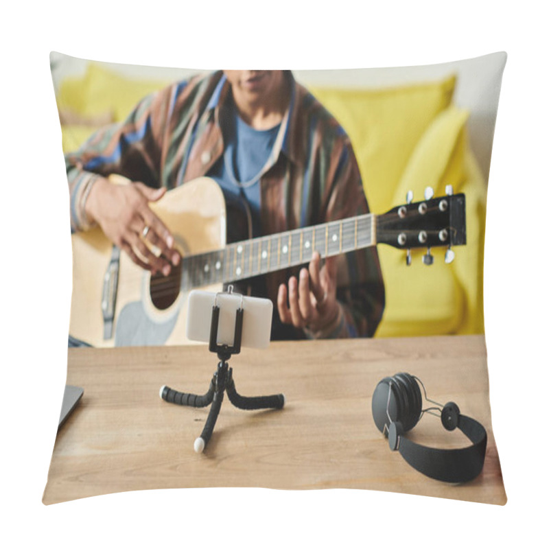 Personality  A Young African American Musician Plays An Acoustic Guitar On A Table While Filming For His Blog. Pillow Covers