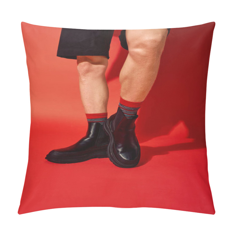 Personality  A Man Models Festive Holiday Fashion Featuring Stylish Black Boots Paired With Vibrant Red And Striped Socks. Pillow Covers