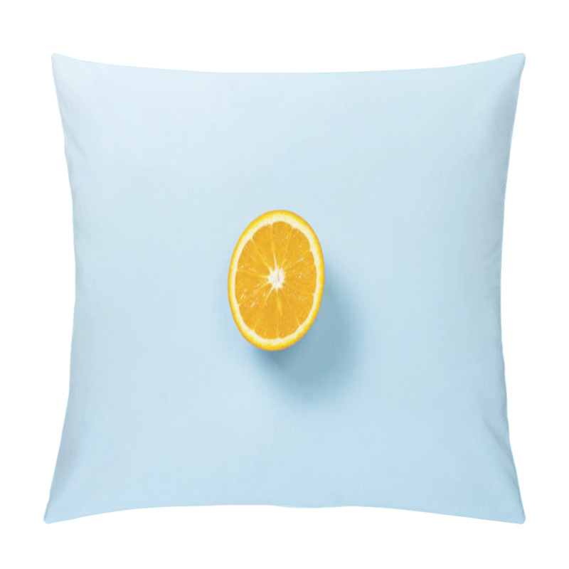 Personality  Cut Half Of Orange On A Blue Background. Minimalism. Concept Of Tropics, Healthy Eating, Vitamins. Flat Lay, Top View. Pillow Covers