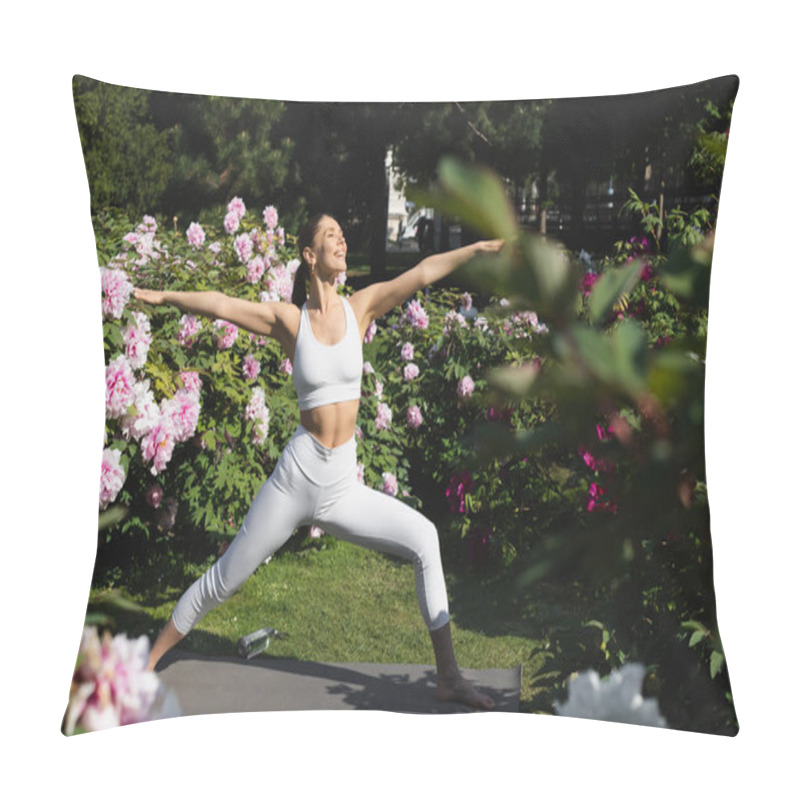 Personality  Happy Sportive Woman Practicing Warrior Pose With Outstretched Hands In Park  Pillow Covers