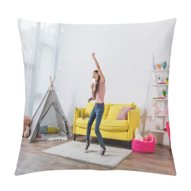 Personality  Happy Preteen Girl In Wireless Headphones Holding Smartphone While Dancing In Modern Living Room  Pillow Covers