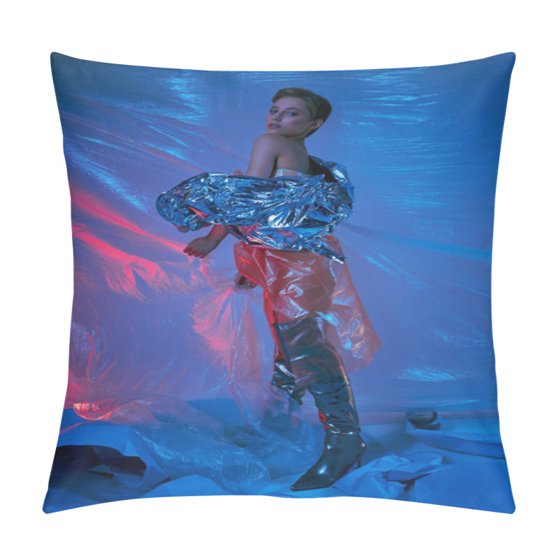 Personality  A Woman In A Silver Jacket And Black Boots Poses Amidst A Swirling Sea Of Blue And Red Plastic. Pillow Covers