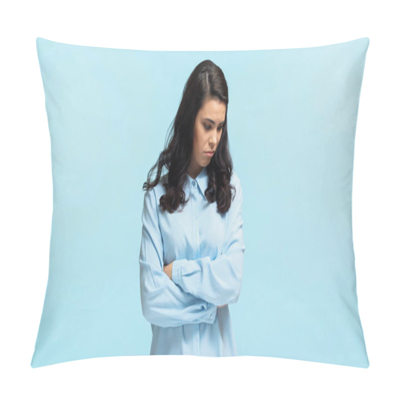 Personality  Sad Young Woman In Shirt Standing With Crossed Arms Isolated On Blue Pillow Covers