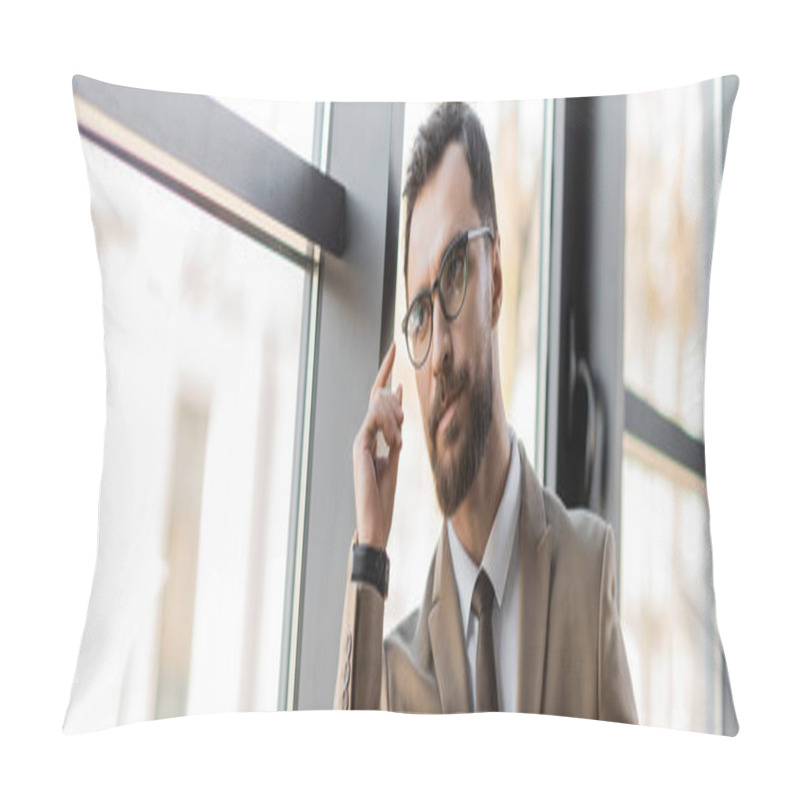 Personality  Bearded Businessman In Trendy Eyeglasses, Beige Blazer And Tie Holding Hand Near Face, Looking Away And Thinking Near Windows In Modern Office, Banner Pillow Covers