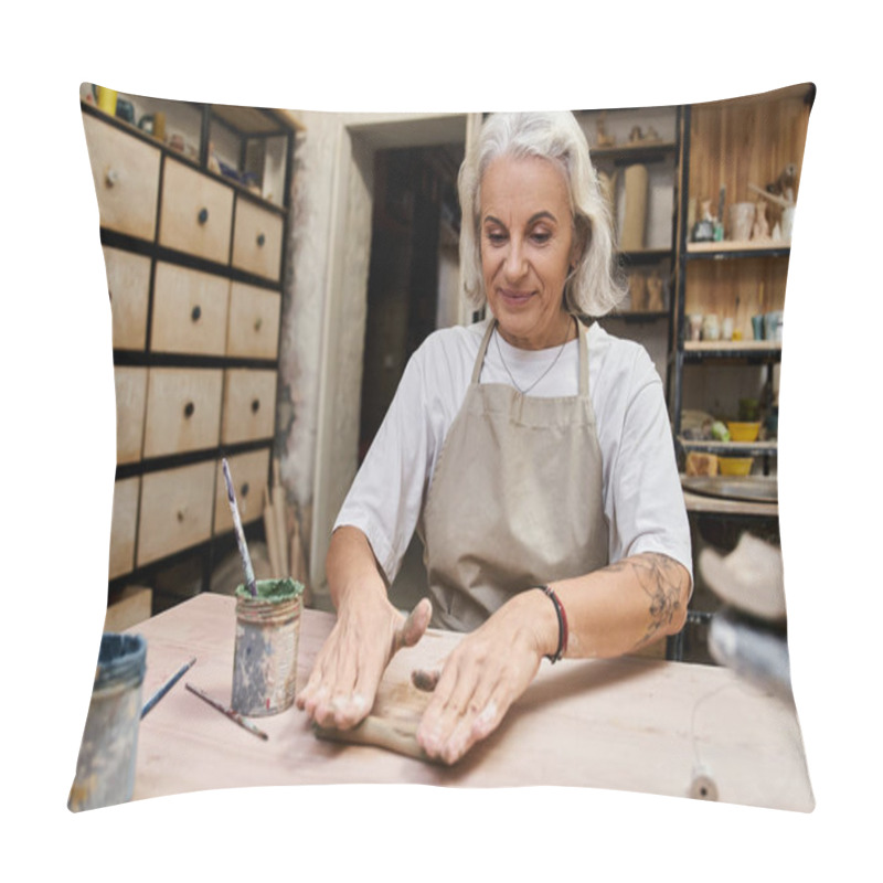 Personality  A Talented Mature Woman Shapes Clay At Her Workspace, Surrounded By Creative Tools. Pillow Covers