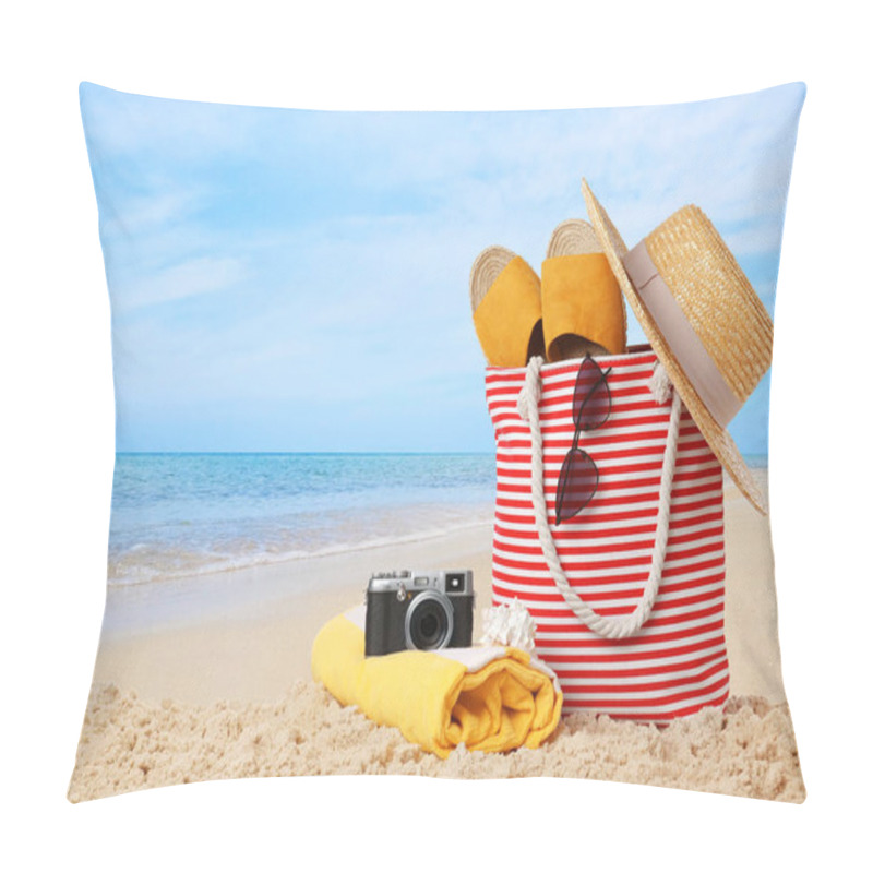 Personality  Stylish Bag With Different Accessories On Sandy Beach Near Ocean. Space For Text  Pillow Covers