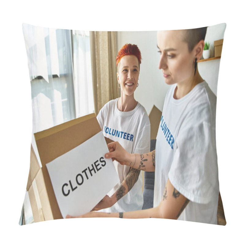 Personality  A Young Lesbian Couple In Volunteer T-shirts Holding A Box Of Donated Clothes. Pillow Covers