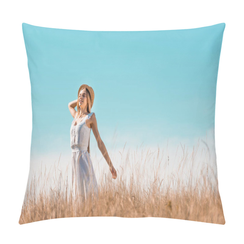 Personality  Selective Focus Of Sensual Woman In White Dress Touching Straw Hat While Standing With Outstretched Hands Against Blue Sky Pillow Covers