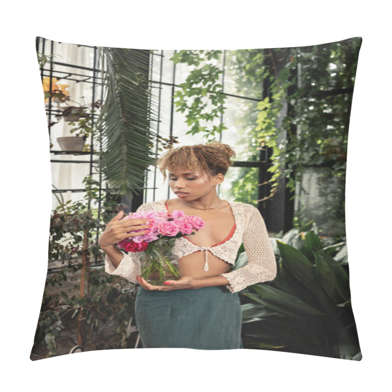 Personality  Trendy Young African American Woman In Knitted Top Holding Vase With Roses And Standing Near Blurred Plants In Garden Center At Background, Trendy Woman With Tropical Flair, Summer Concept Pillow Covers