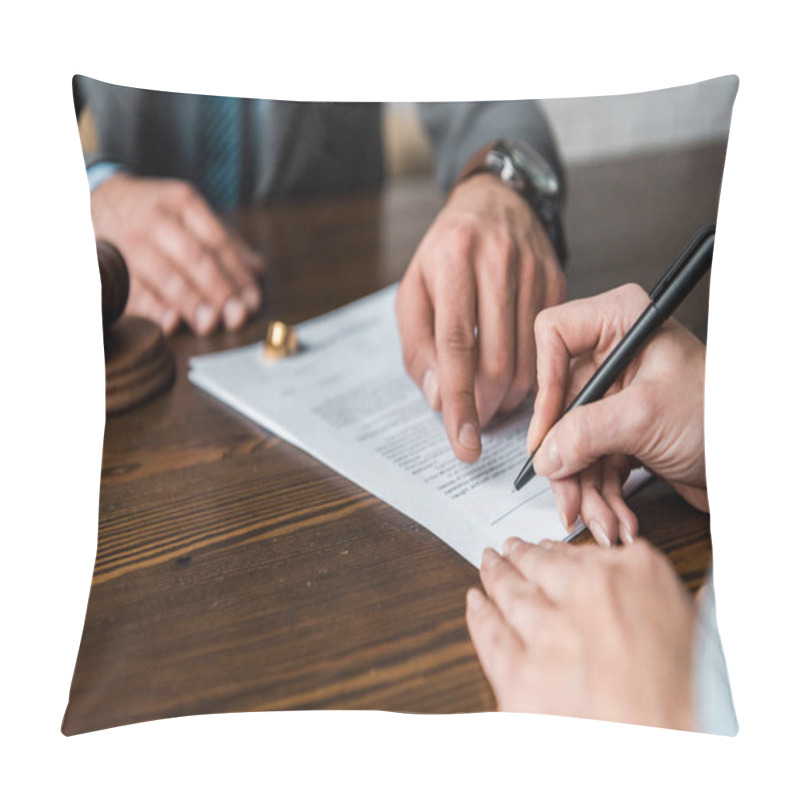 Personality  Cropped Shot Of Judge Pointing At Papers And Client Signing Divorce Decree  Pillow Covers