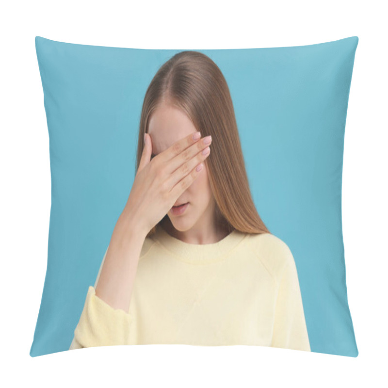 Personality  Embarrassed Woman Covering Face With Hand On Light Blue Background Pillow Covers