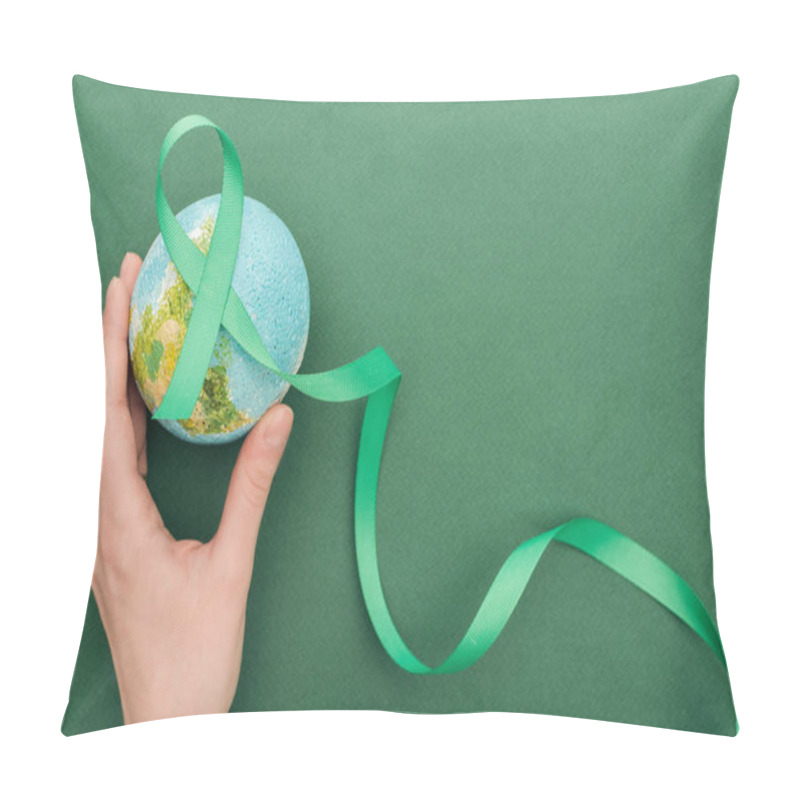 Personality  Cropped View Of Woman Holding Toy Earth And Ribbon On Green Background  Pillow Covers