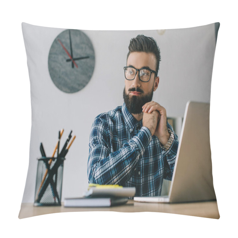 Personality  Thoughtful Young Seo Looking Away While Sitting At Workplace With Laptop Pillow Covers