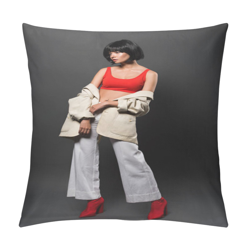 Personality  Beautiful Young Woman With Bobbed Hair In Red Crop Top, Bell-bottoms And Jacket On Grey Pillow Covers