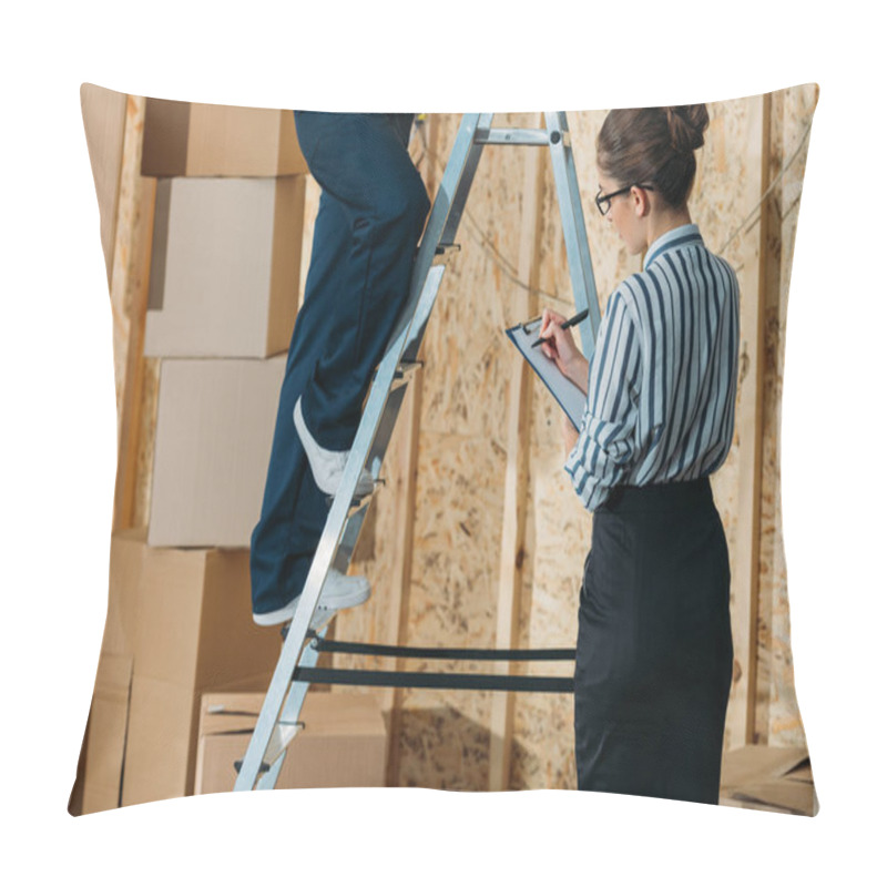 Personality  Businesswoman Writing In Clipboard While Loader Man Standing On A Ladder Pillow Covers