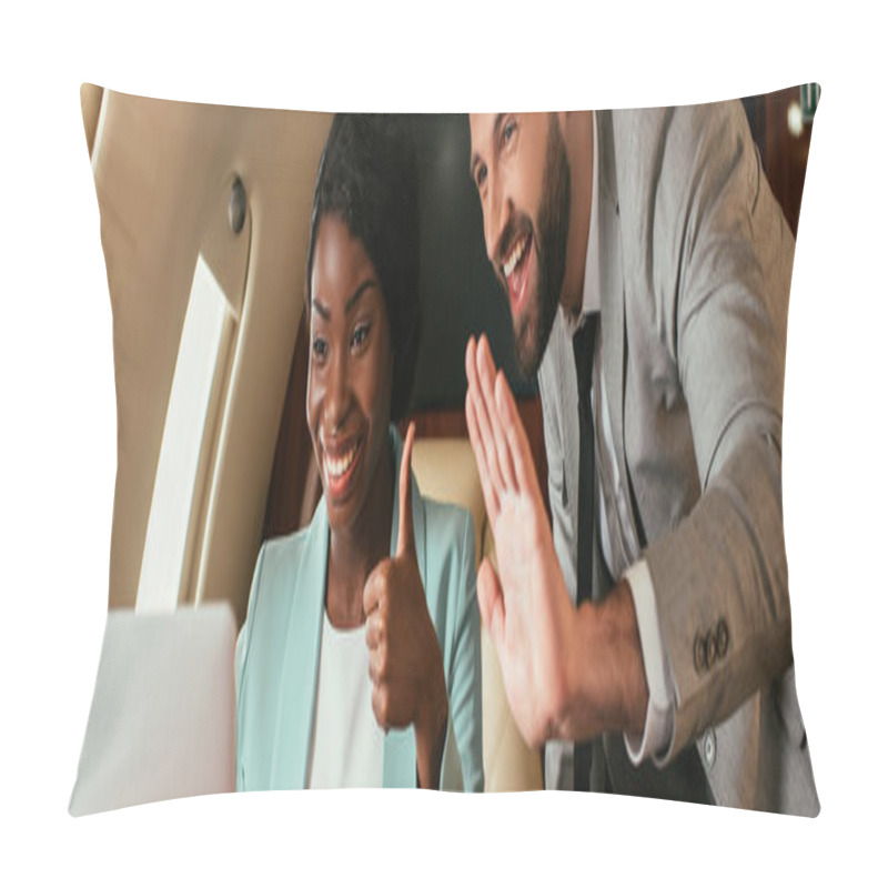 Personality  Panoramic Shot Of Cheerful Businessman Waving Hand And African American Businesswoman Showing Thumb Up During Video Call In Private Plane Pillow Covers