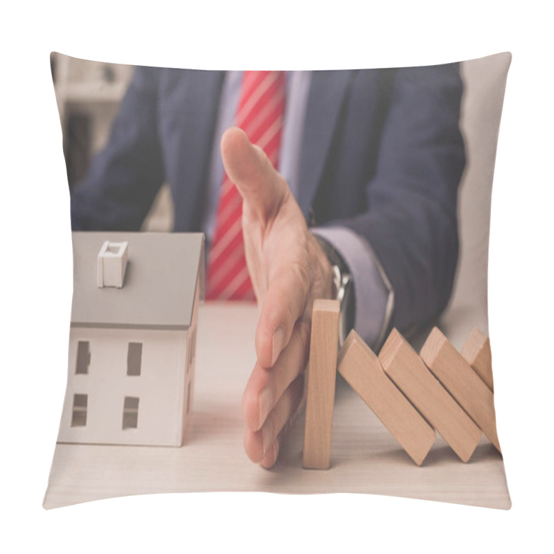 Personality  Cropped View Of Agent Putting Hand On Desk Between Wooden Cubes And Carton House Model  Pillow Covers