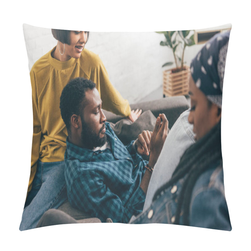 Personality  Group Of Multicultural Friends Sitting On Couch With Smartphone Pillow Covers