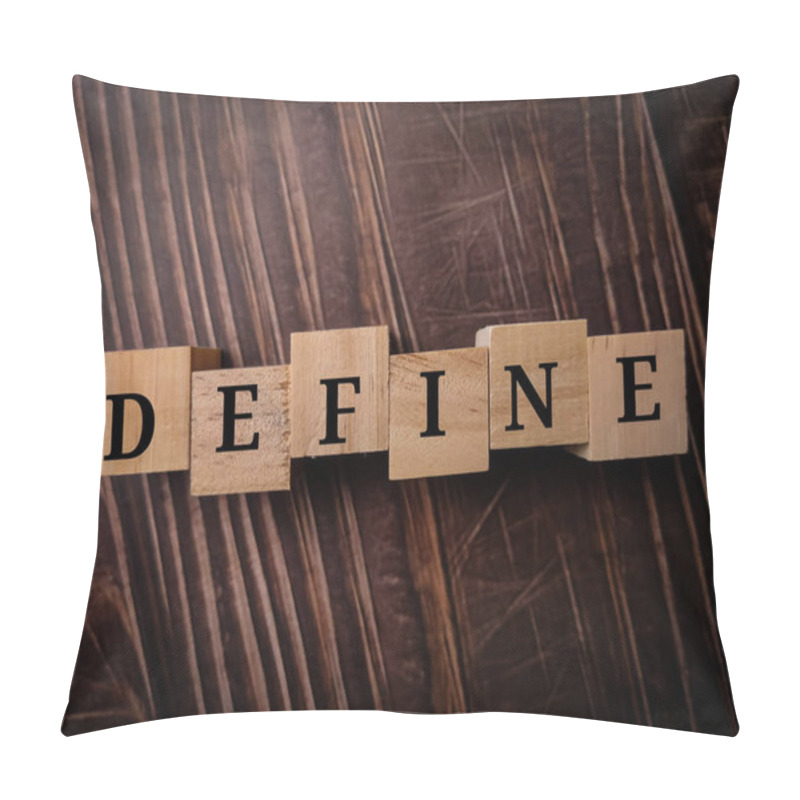 Personality  Wooden Cube With Word DEFINE On A Wooden Table Background. Pillow Covers