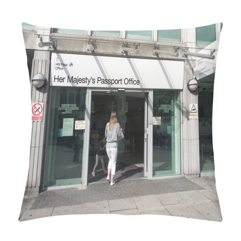 Personality  London, UK: July 27, 2016: A Woman Enters Her Majesty's Passport Office.The Official Passport Office In London Offers Premium One Day Appointments And Fast-Track One Week Appointment Services. Pillow Covers