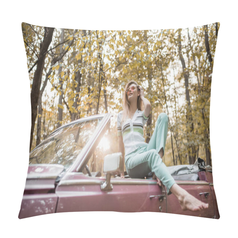 Personality  Happy Barefoot Woman Touching Hair And Looking Away While Posing In Cabriolet In Sunshine On Blurred Foreground Pillow Covers