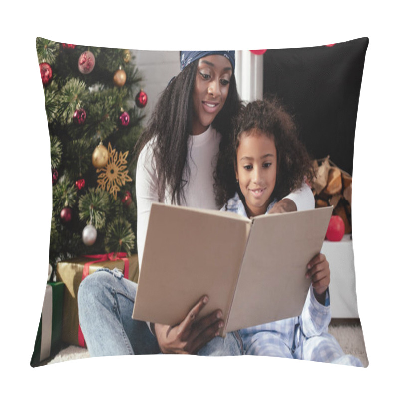 Personality  Smiling African American Mother And Daughter Reading Book Together At Home, Christmas Concept Pillow Covers