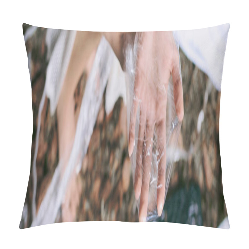 Personality  A Womans Hand Holds A Piece Of Plastic In Front Of A Swamp Filled With Plastic Garbage. Pillow Covers