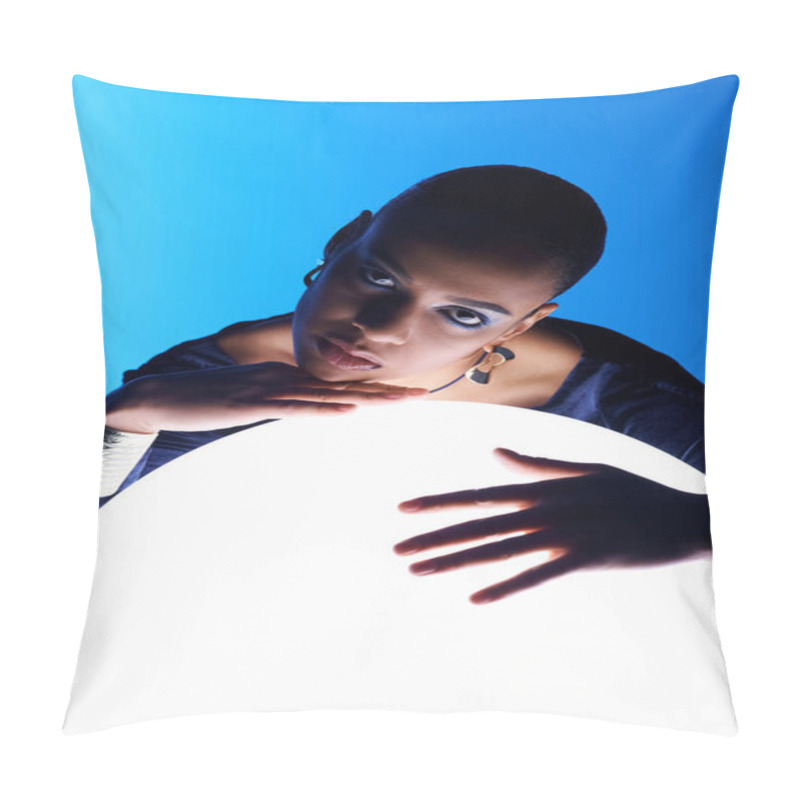 Personality  A Young African American Woman Delicately Holds A Large White Object In Her Hands. Pillow Covers