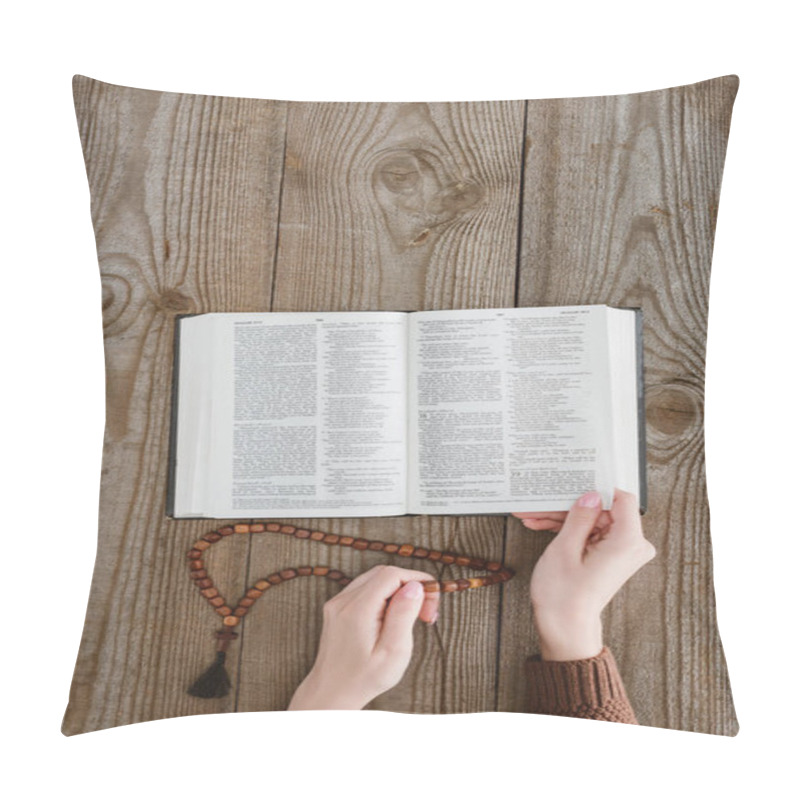 Personality  Cropped Shot Of Woman Reading Holy Bible And Holding Beads On Wooden Table Pillow Covers