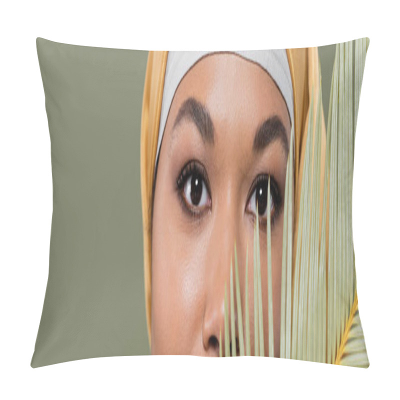 Personality  Cropped View Of Muslim Multiracial Woman With Makeup Looking At Camera Near Exotic Leaf Isolated On Green, Banner Pillow Covers