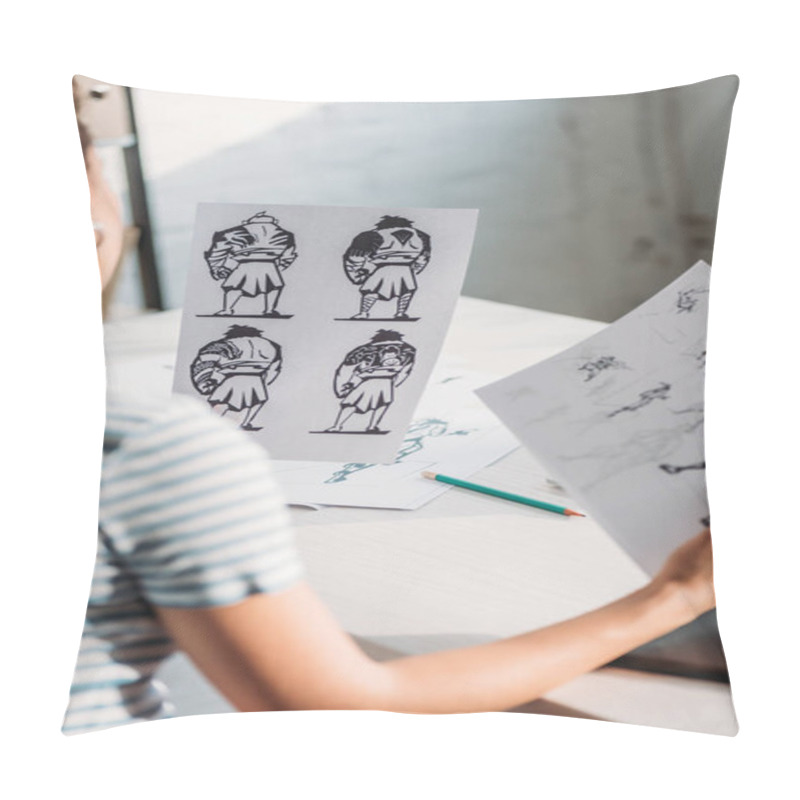 Personality  Selective Focus Of Illustrator Holding Papers With Sketches  Pillow Covers