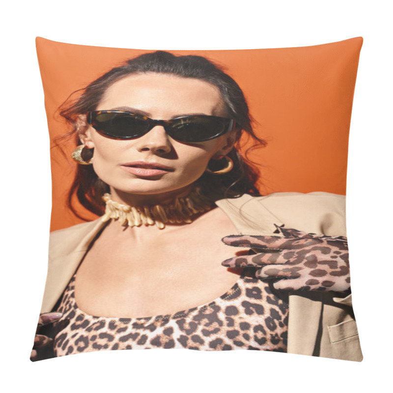 Personality  A Stylish Woman Exudes Confidence In A Leopard Print Top And Trendy Sunglasses Against A Vibrant Orange Background. Pillow Covers