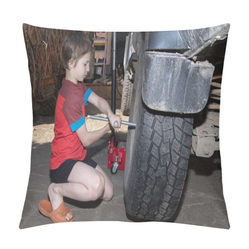 Personality  Boy Helps To Change The Wheel Of The Car. Child Works In The Backyard Of A House Near The Garage, Sunny Summer Day. Side View Pillow Covers