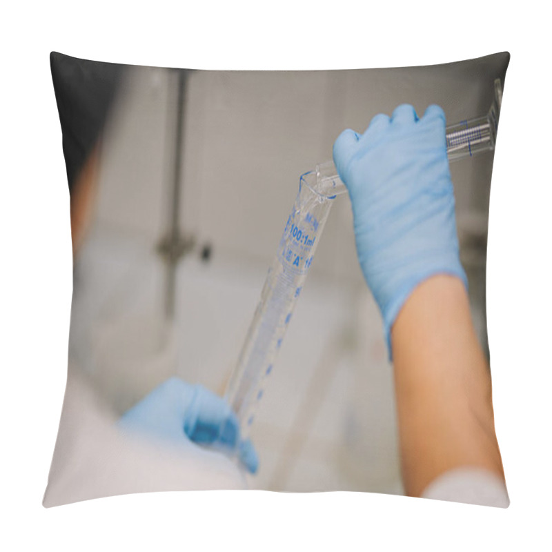 Personality  Valmiera, Latvia - November 18, 2024 - Close-up Of Gloved Hands Pouring Liquid Into A Graduated Cylinder During A Laboratory Experiment, Showcasing Precision And Measurement Tools. Pillow Covers