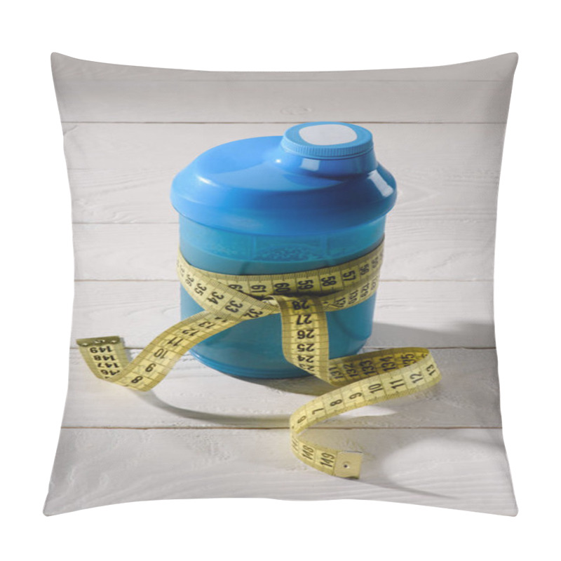 Personality  Close-up Shot Of Protein Shaker Tied With Measuring Tape On White Wooden Table Pillow Covers