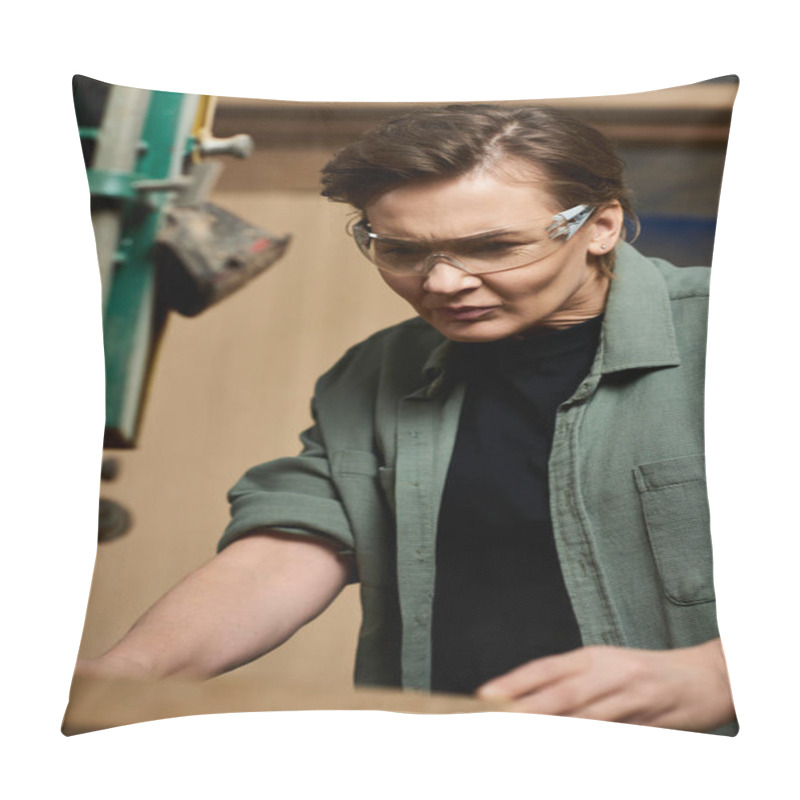 Personality  A Focused Carpenter Works Diligently With Wood, Showcasing Craftsmanship In Her Well-lit Workshop. Pillow Covers