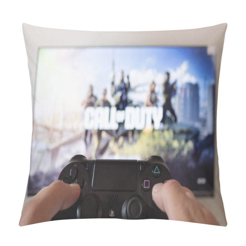 Personality  A Male Hand Holding A Play Station 4 Controller With Warzone Call Of Duty Shooter Intro Video Game At Background Pillow Covers