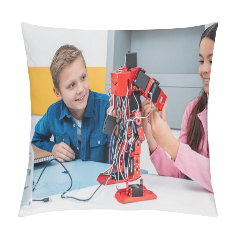 Personality  Adorable Schoolgirl And Smiling Schoolboy Sitting At Desk And Working Together On Robot Model At STEM Class Pillow Covers